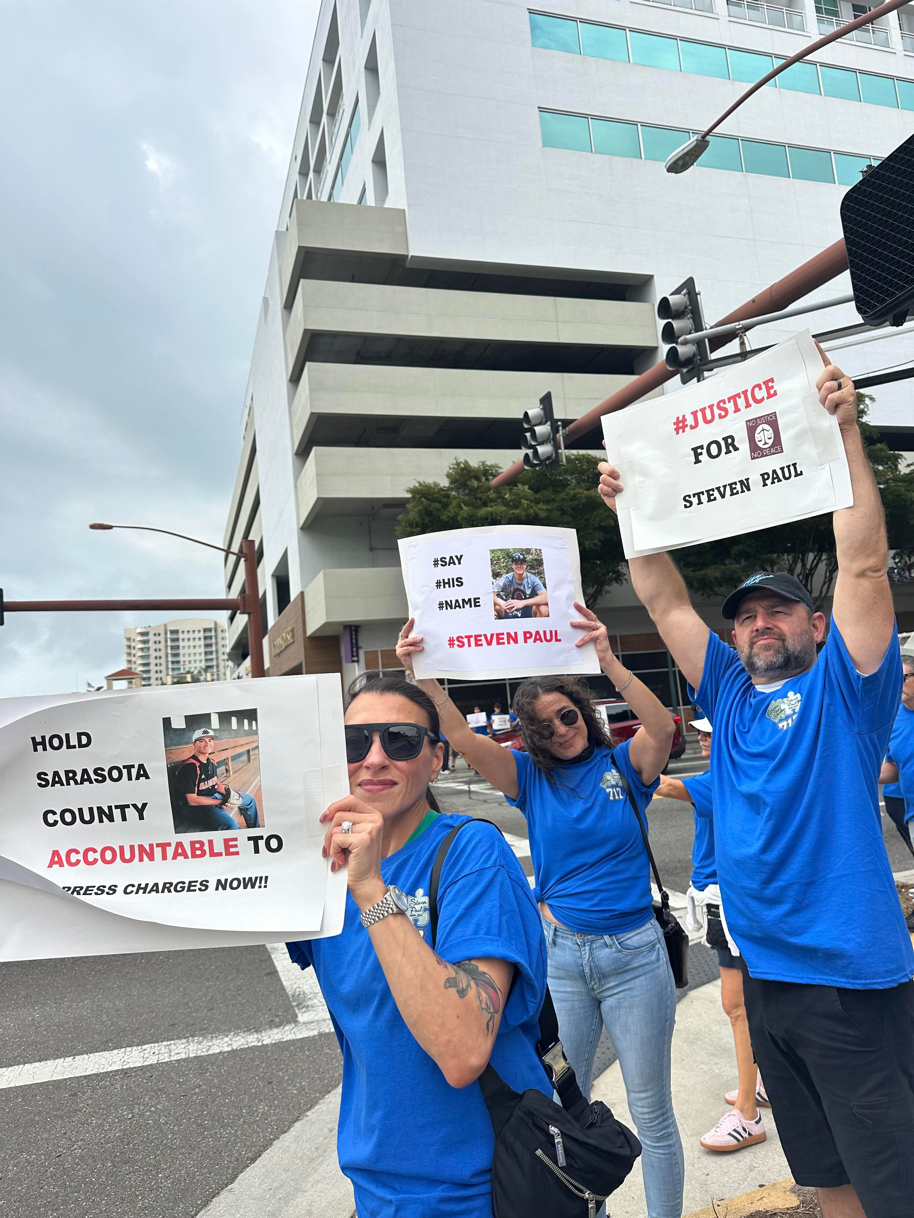 Community members with Justice for Steven signs at State Attorney's Office